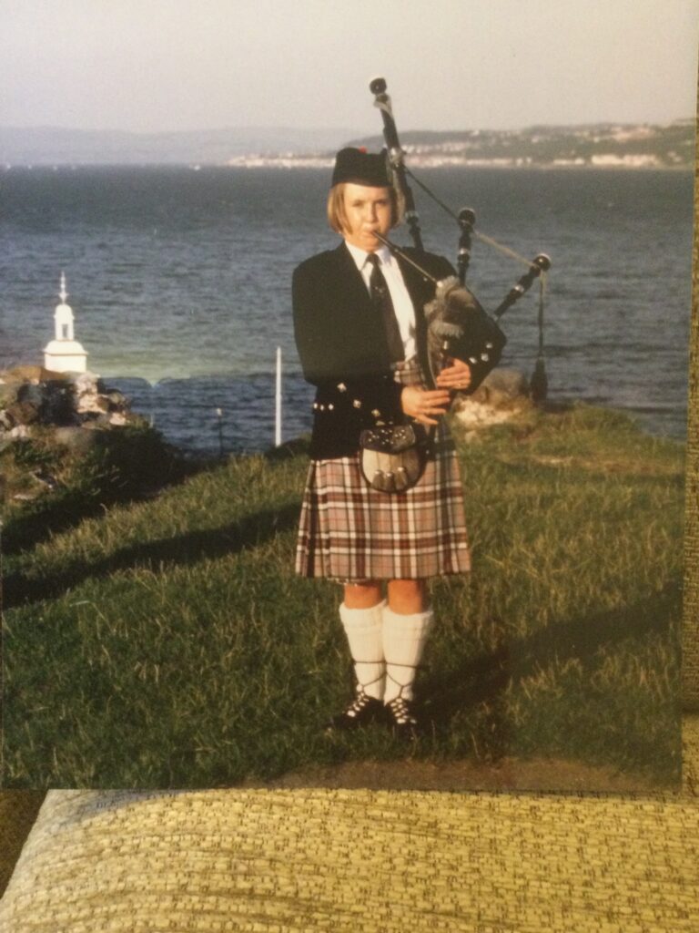 Piper playing bagpipes